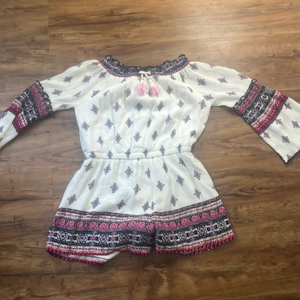 A romper kind of colorful kids size 7